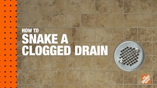 How To Snake A Clogged Drain A DIY Digital Workshop  The Home Depot [upl. by Ducan]