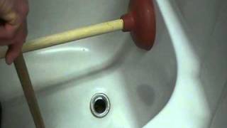 How to Unplug or clear a bathtub drain Easily [upl. by Neeliak494]