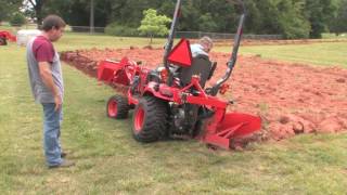 How To Plow With A SubcompactKubota BX Tractor [upl. by Cece]