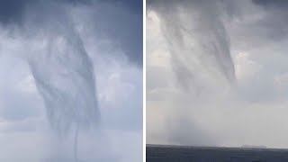 Man Captures Massive MultipleVortex Waterspout [upl. by Rianna203]