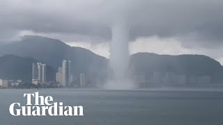 Dramatic waterspout forms near Malaysian island [upl. by Acinaj763]